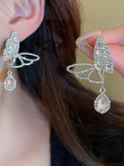 Sweet Hollow Butterfly Water Drop Tassel Silver Needle Earrings MSE20017